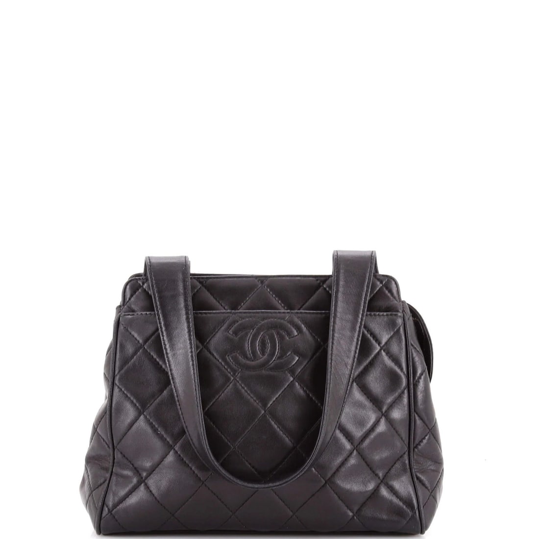 Chanel small quilted lambskin shoulder bag with front pocket.: Chanel small quilted lambskin shoulder bag with front pocket. A true vintage Chanel gem, this small quilted lambskin shoulder bag boasts the iconic brand's signature style with its sleek black exterio