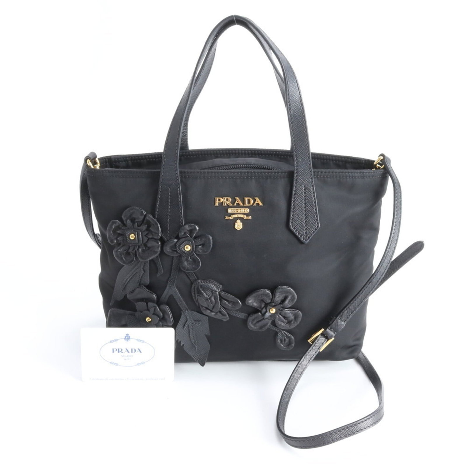 Prada Shoulder Bag, Tote Bag Nylon, Leather: Prada Shoulder Bag, Tote Bag Nylon, Leather A sleek and sophisticated Prada shoulder bag, crafted from both durable nylon and supple leather, boasts a timeless design that exudes luxury and elegance.
