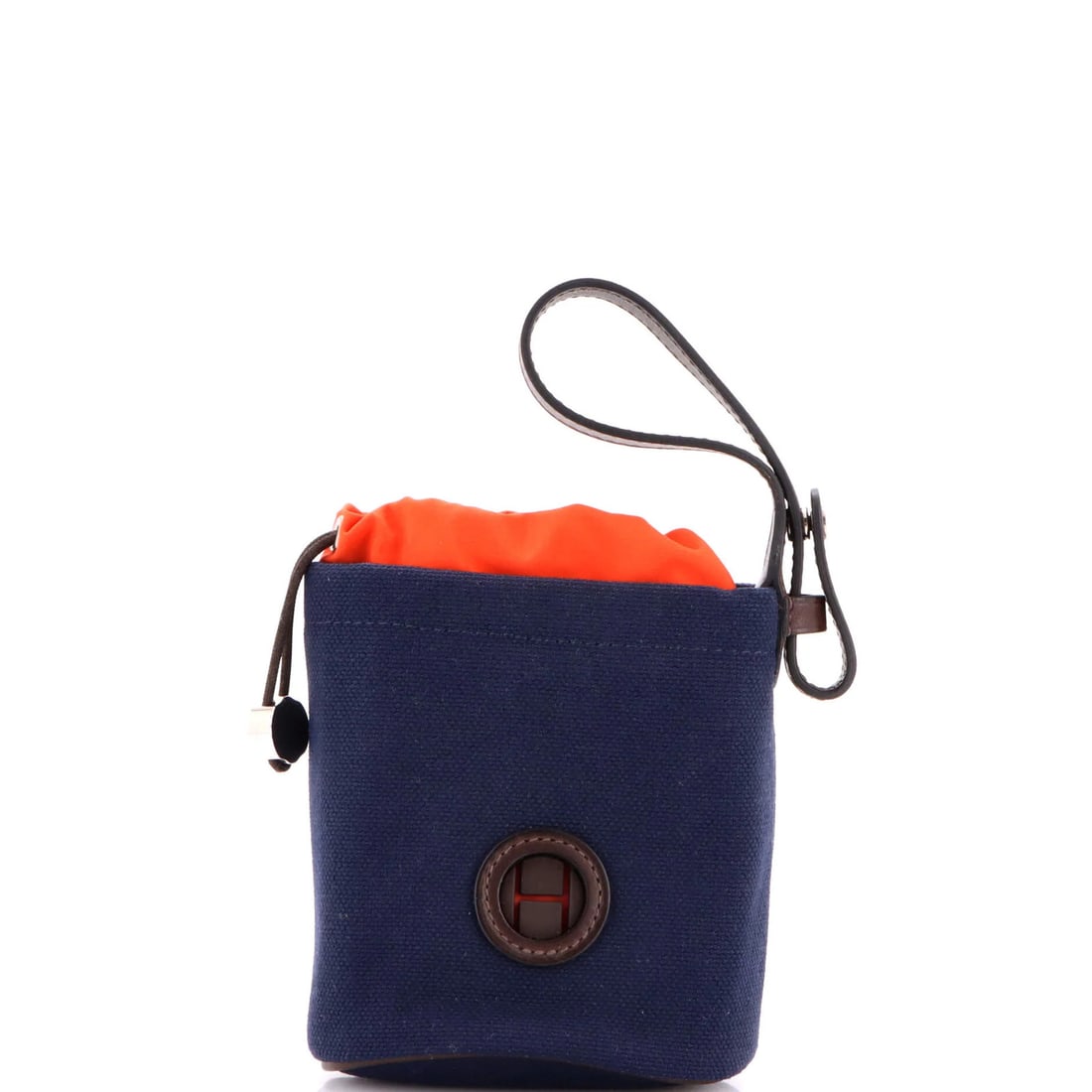 Hermes Dog Pouch Toile On The Go: Hermes Dog Pouch Toile On The Go The iconic Hermes On-The-Go Dog Pouch Toile is a stylish and practical accessory for the modern pet parent. With its durable canvas exterior, vibrant orange interior,