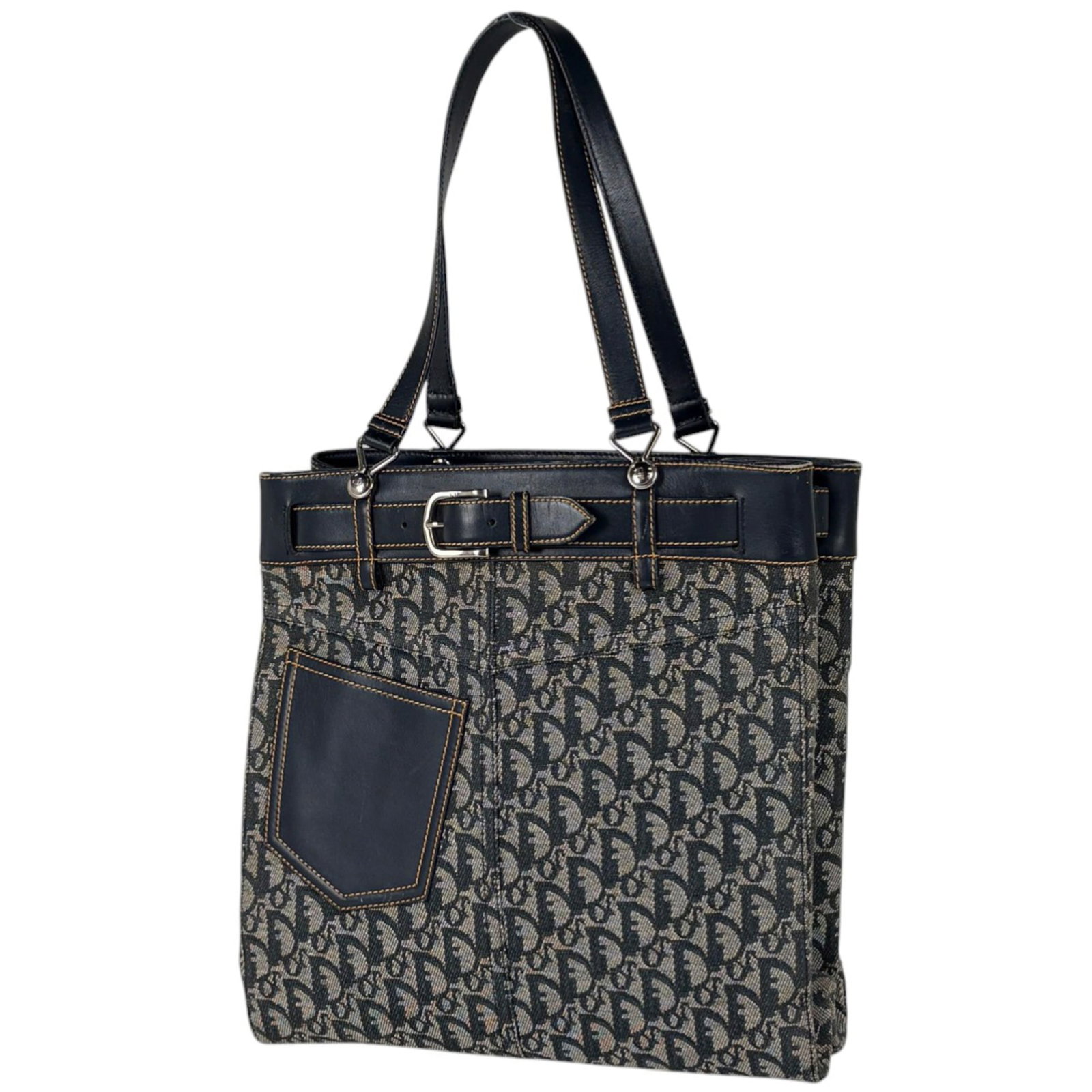 Christian Dior Canvas Tote Bag: Christian Dior Canvas Tote Bag A pre-owned Christian Dior canvas tote bag in navy, boasting classic Dior design with a timeless shoulder strap and spacious interior perfect for daily essentials and wo