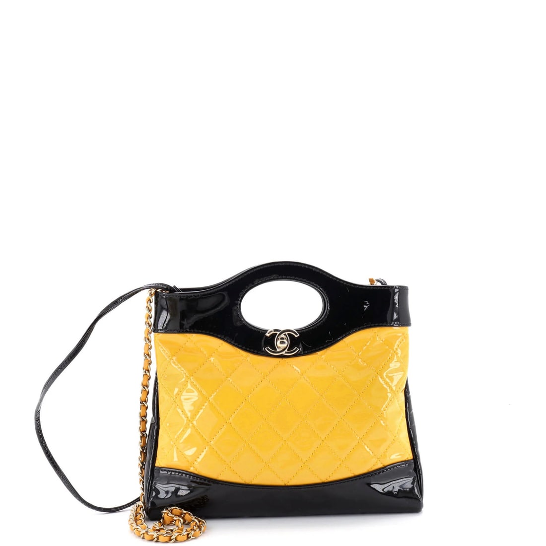 Chanel Mini Quilted Shopping Bag Patent: Chanel Mini Quilted Shopping Bag Patent A rare opportunity to own a miniature version of the iconic Chanel quilted shopping bag, crafted from patent leather and boasting a vibrant yellow hue that adds
