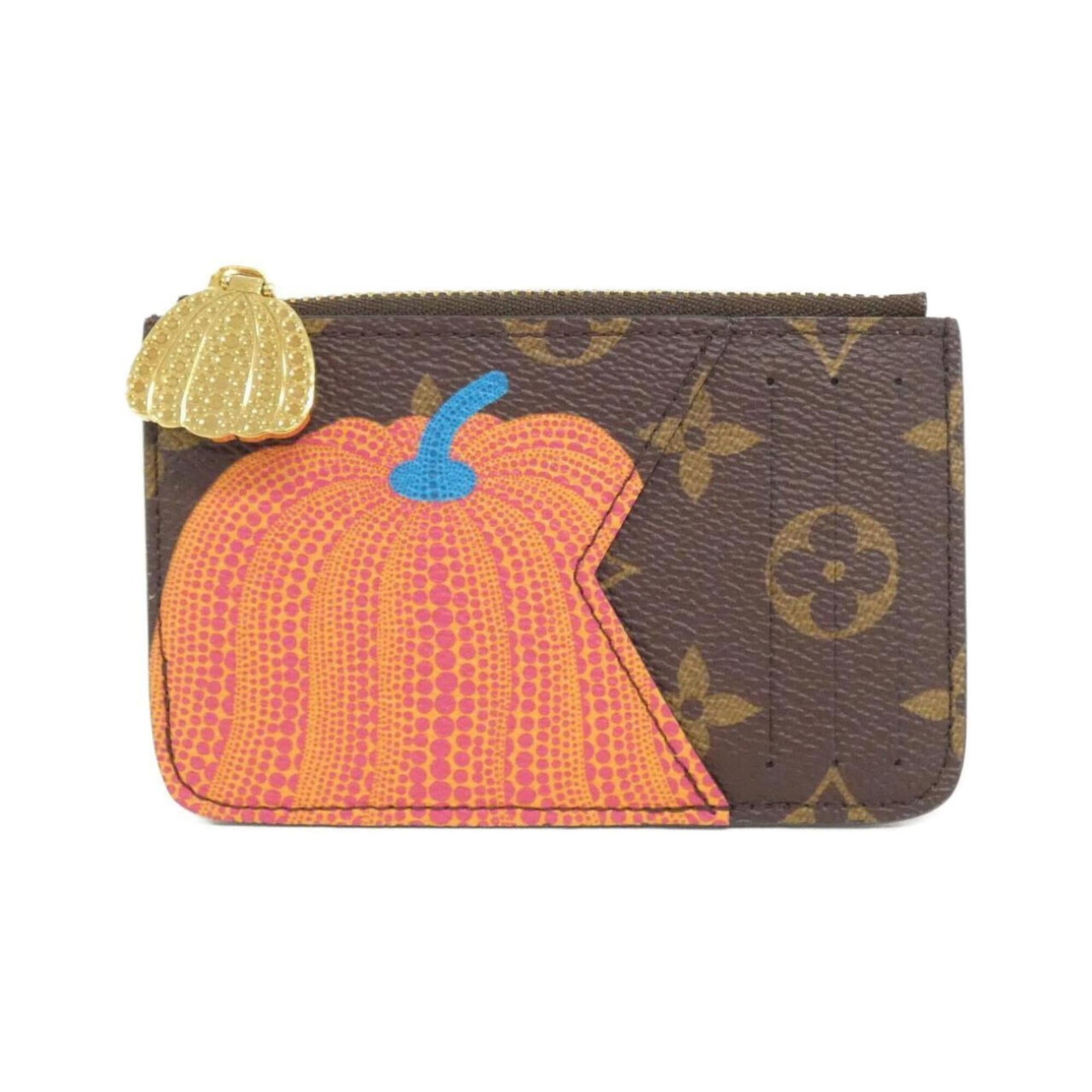 Louis Vuitton coated canvas coin case: Louis Vuitton coated canvas coin case A stylish and practical accessory for the modern woman, this Louis Vuitton coated canvas coin case is a timeless addition to any purse or wallet. With its