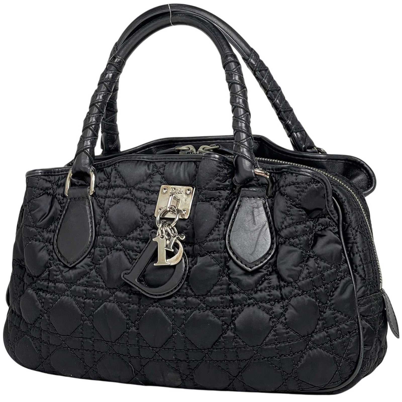 Christian Dior Nylon Leather Handbag: Christian Dior Nylon Leather Handbag A chic and timeless piece, this Christian Dior Nylon Leather Handbag exudes sophistication with its sleek black design and premium nylon leather exterior. The clas