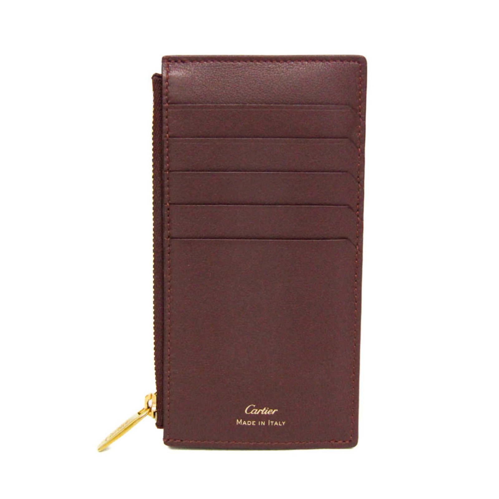 Cartier Coin Purse/ Coin Case Leather: Cartier Coin Purse/ Coin Case Leather A sleek and sophisticated Cartier coin purse, perfect for adding a touch of luxury to your daily essentials. With its rich Bordeaux leather exterior and zippered