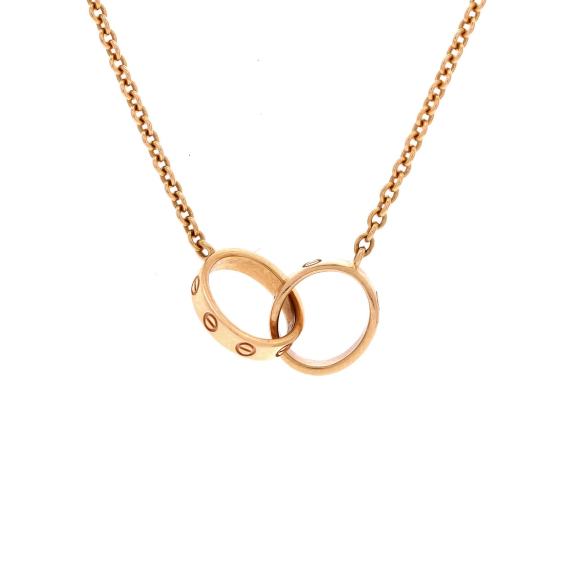 Cartier love necklace gold rose interlocking: Cartier love necklace gold rose interlocking A stunning Cartier Love necklace in 18K rose gold, boasting an elegant interlocking design that exudes sophistication and glamour. The subtle sheen of the
