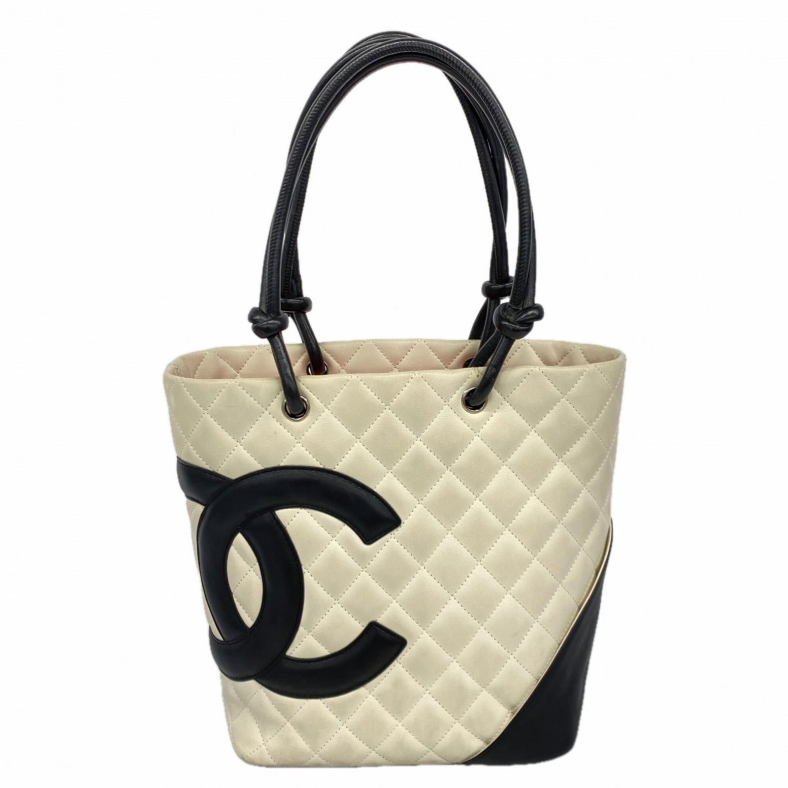 Chanel Tote Bag Leather: Chanel Tote Bag Leather A timeless and sophisticated Chanel tote bag, crafted from luxurious lambskin leather in sleek black or crisp white, is the epitome of chic elegance. With its classic design