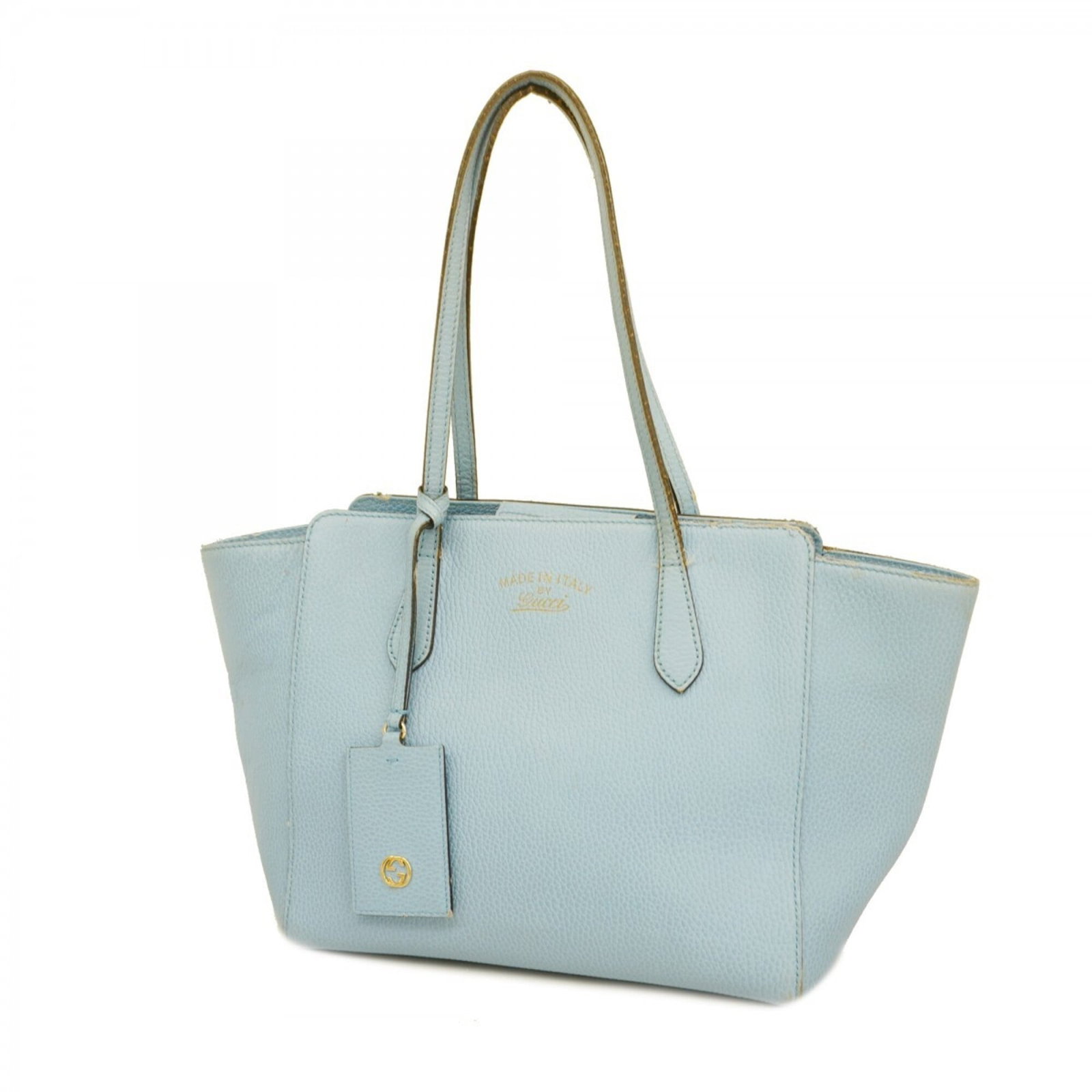 Gucci Tote Bag Leather: Gucci Tote Bag Leather A pre-owned Gucci tote bag in stunning sky blue leather, adorned with elegant gold hardware, adds a touch of luxury to any outfit. With its classic design and premium