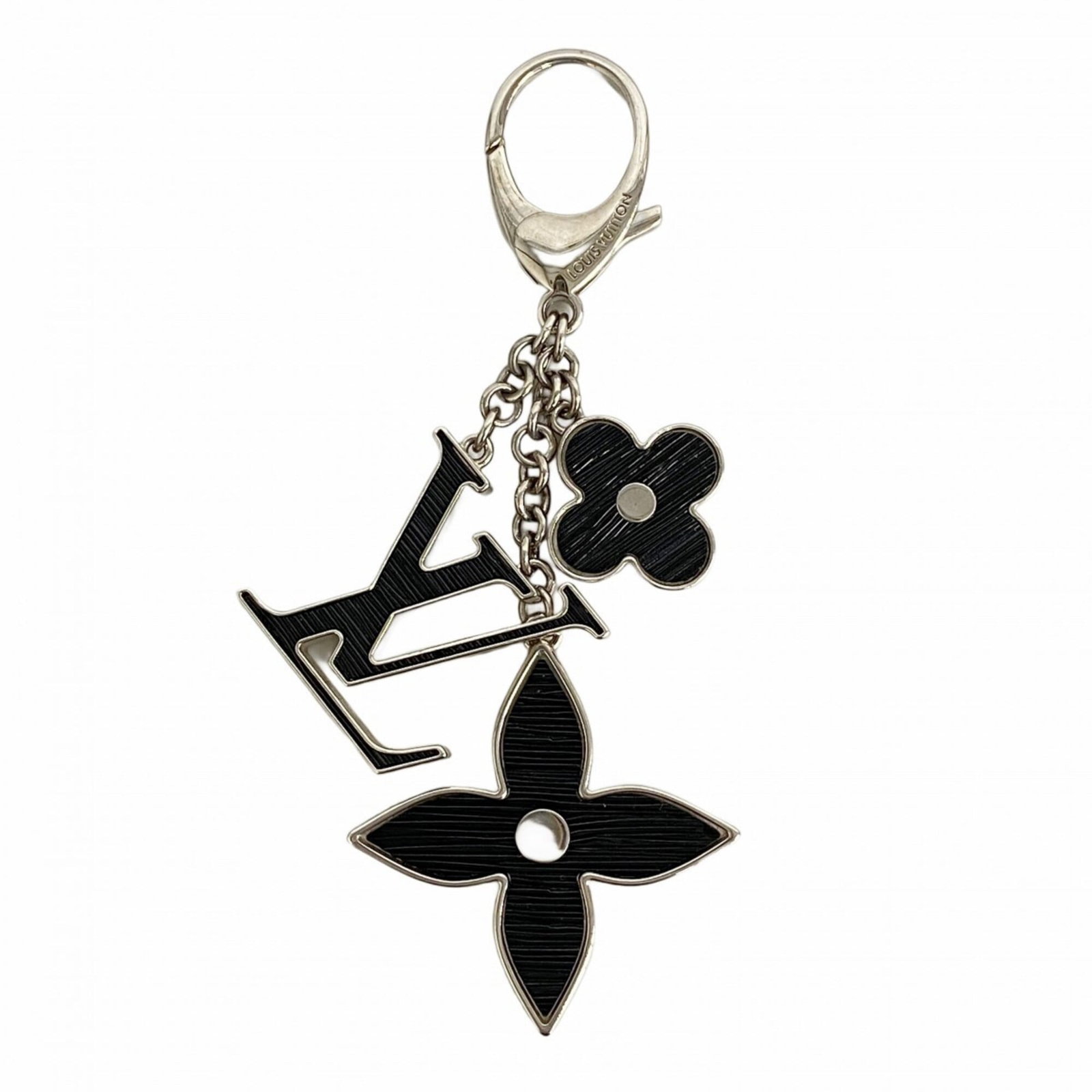 Louis Vuitton Keyring: Louis Vuitton Keyring A luxurious touch for your keys, this Louis Vuitton keyring boasts the iconic monogram pattern and sleek design that has become synonymous with style and sophistication. Made fro