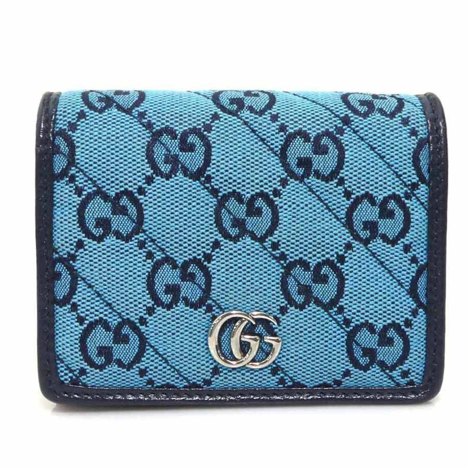 Gucci Bi Fold Gg Canvas Wallet: Gucci Bi Fold Gg Canvas Wallet A stylish and functional Gucci bi-fold wallet, crafted from high-quality Gg canvas, boasts a sleek blue or pink hue that adds a pop of personality to any outfit. With