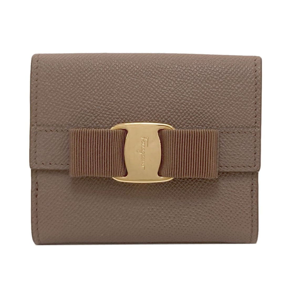 Salvatore Ferragamo Vara ribbon Bifold Wallet with Coin Pocket Leather: Salvatore Ferragamo Vara ribbon Bifold Wallet with Coin Pocket Leather Elevate your everyday style with the iconic Salvatore Ferragamo Vara ribbon bifold wallet, expertly crafted from rich cocoa