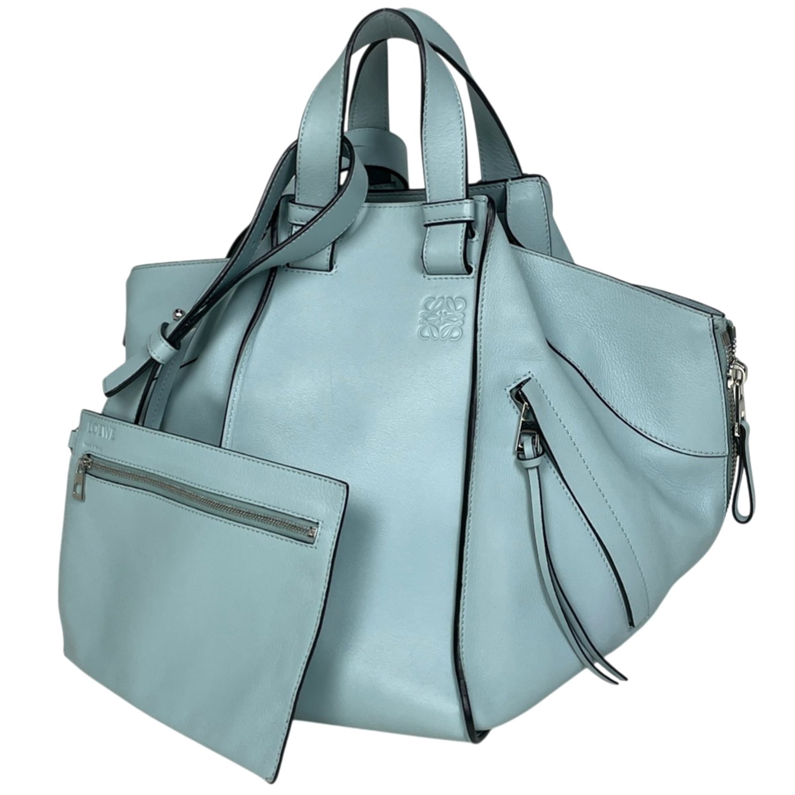 Loewe Handbag, Pouch, Shoulder Bag Leather: Loewe Handbag, Pouch, Shoulder Bag Leather A stunning Loewe leather handbag in light blue, boasting a classic design with clean lines and premium quality construction. With its spacious interior and