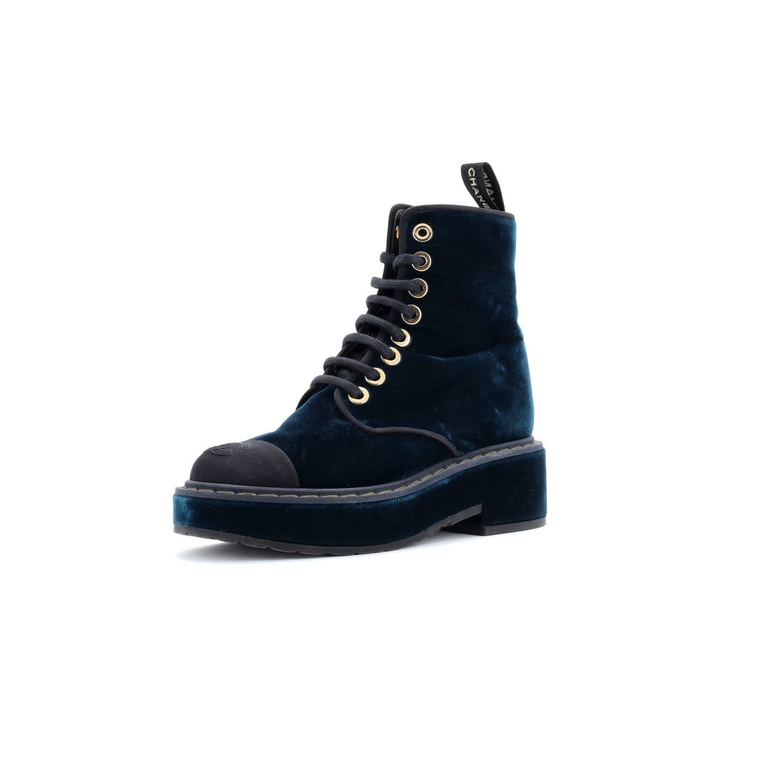Chanel Women's Combat Boots in Velvet CC.: Chanel Women's Combat Boots in Velvet CC. Elevate your style with the iconic Chanel Women's Combat Boots in Velvet CC, boasting a striking blue velvet exterior and luxurious green leather interior. Th