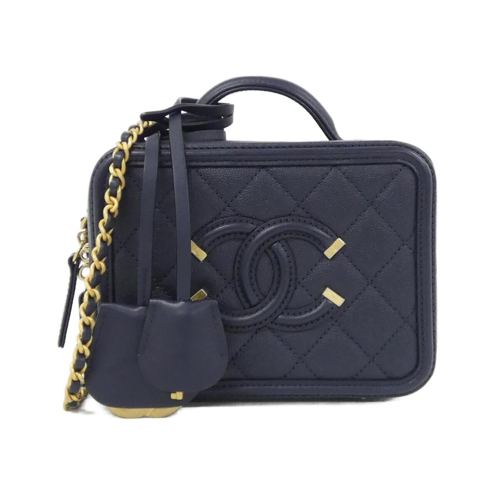 Chanel Handbag of Grained Calfskin: Chanel Handbag of Grained Calfskin A timeless Chanel classic, this navy handbag boasts rich, supple grained calfskin that develops a beautiful patina with age. With its sleek 12cm dimensions and
