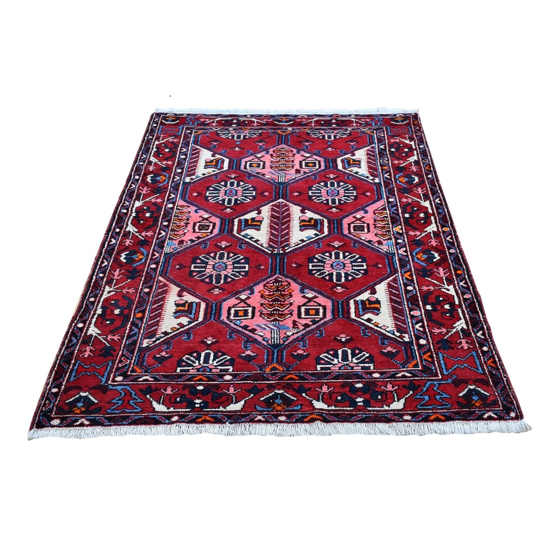 4'4"x6'8" Red New Farsian Amadan Wool Hand Knotted Vivid Colors Rug: 4'4"x6'8" Red New Farsian Amadan Wool Hand Knotted Vivid Colors Rug Experience the vibrant colors and rich texture of this stunning 2000-year-old Turkish hand-knotted wool rug, measuring 44" x 68".