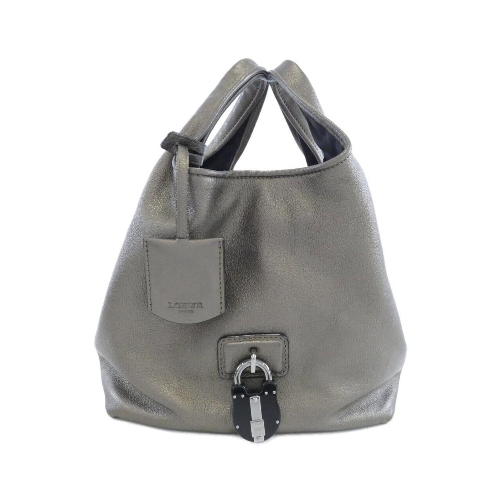 Leather Loewe Handbag: Leather Loewe Handbag A timeless and sophisticated choice for the discerning woman, this pre-owned Loewe handbag boasts sleek metallic beige leather with a classic design that exudes elegance. With