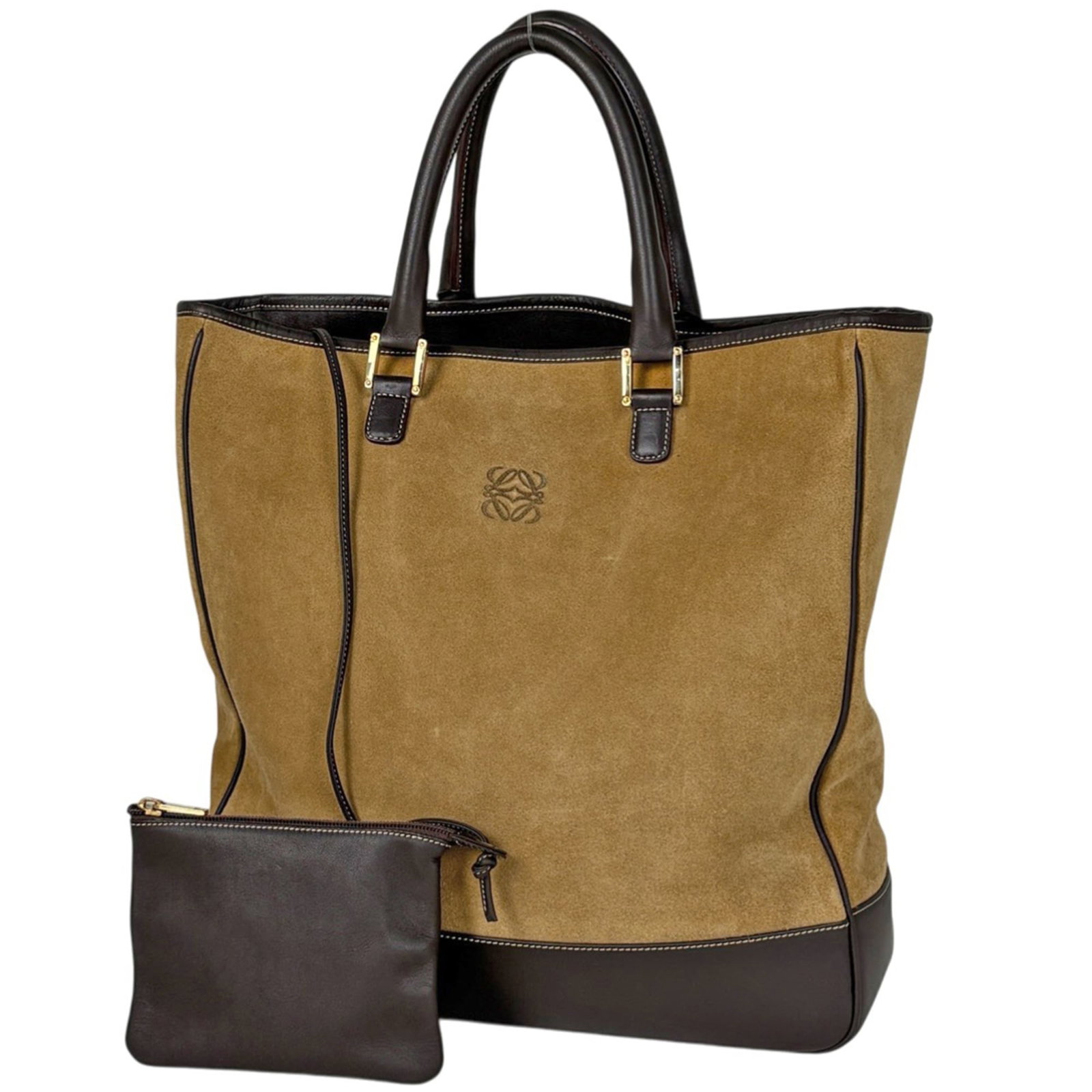 Loewe Leather Suede Tote Bag: Loewe Leather Suede Tote Bag A timeless and sophisticated Loewe tote bag, crafted from rich brown suede leather that develops a beautiful patina with age. With its classic design and spacious