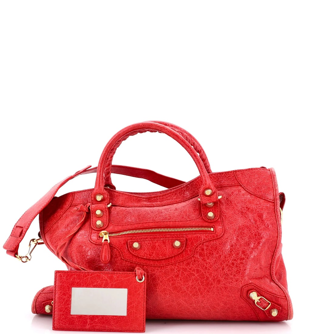 Balenciaga City Classic Studs Bag Leather Medium: Balenciaga City Classic Studs Bag Leather Medium A statement piece for the modern woman, this Balenciaga City Classic Studs Bag boasts bold red leather exterior with gold hardware and sleek stud