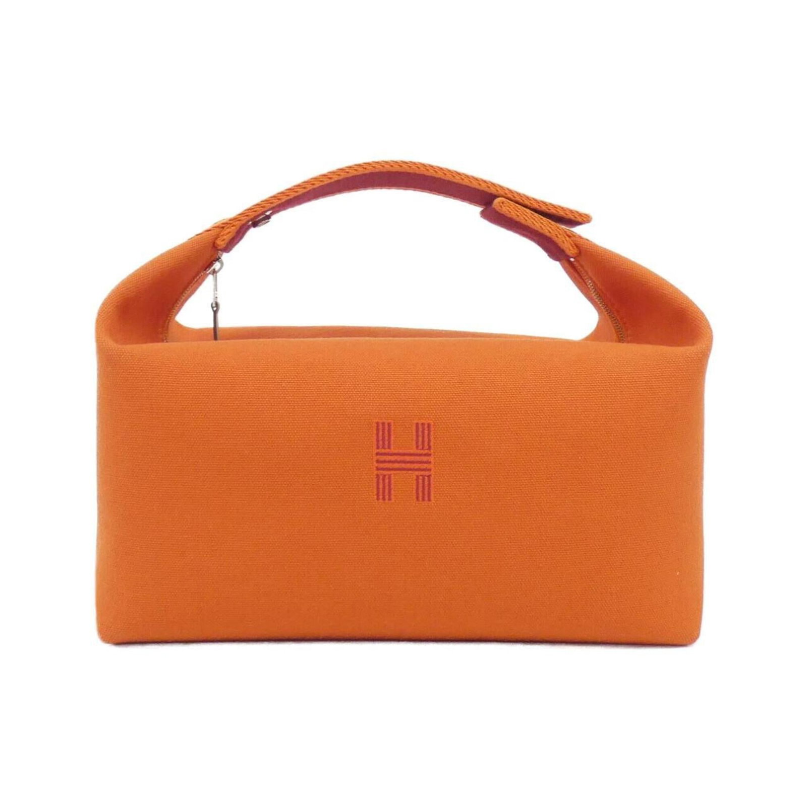 Hermes Handbag Canvas Pouch: Hermes Handbag Canvas Pouch A vibrant orange canvas pouch from the iconic French fashion house Hermes, perfect for adding a pop of color to your daily essentials. With its classic design and durable