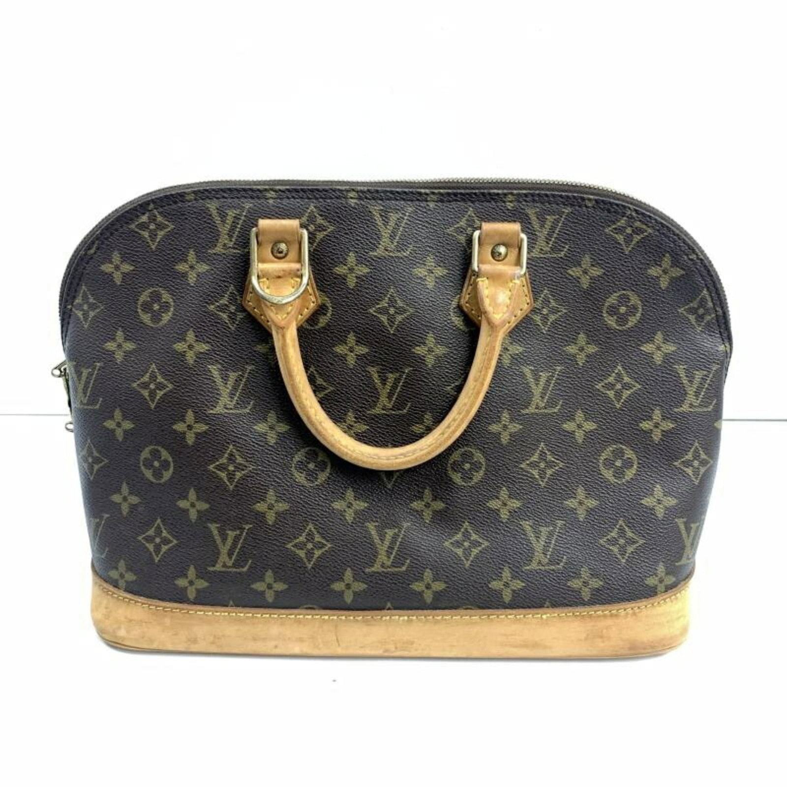 Louis Vuitton is a handbag: Louis Vuitton is a handbag A timeless piece from the iconic Louis Vuitton brand, this handbag boasts classic monogram pattern and premium leather construction. With its spacious interior and durable