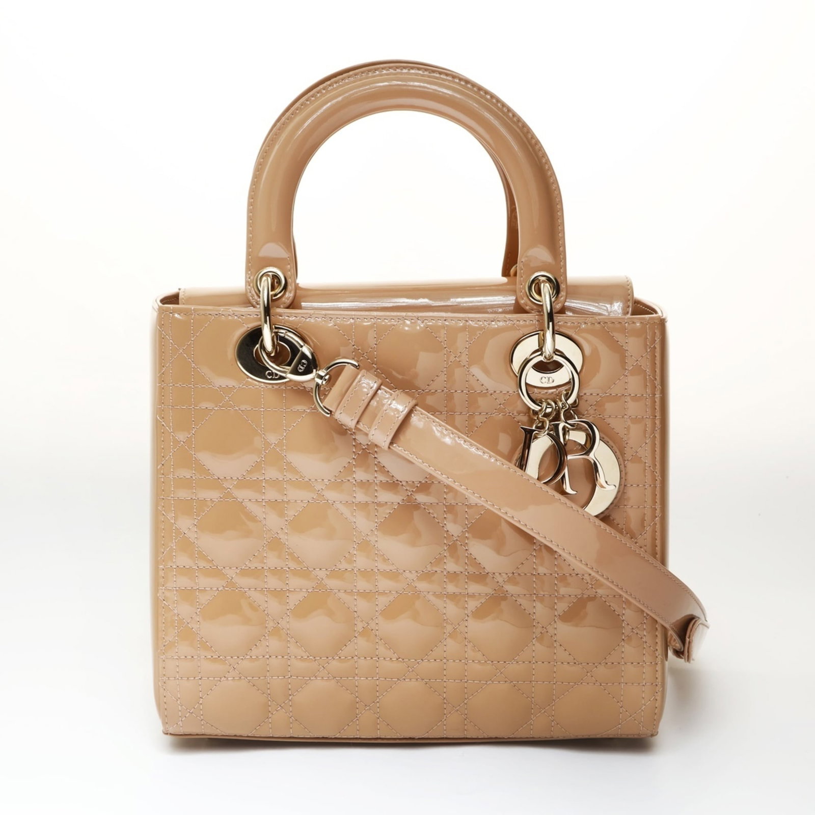 Christian Dior Shoulder Bag: Christian Dior Shoulder Bag Elevate your everyday style with the timeless elegance of Christian Dior's shoulder bag, boasting a chic beige and pink beige color combination that exudes sophistication.