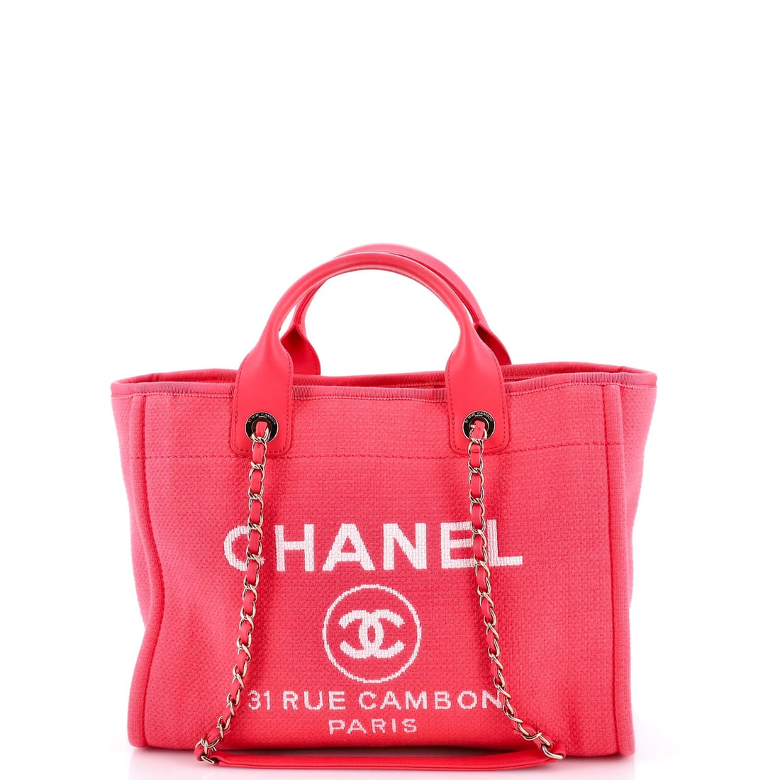Chanel Deauville NM Tote Mixed Fibers Small: Chanel Deauville NM Tote Mixed Fibers Small A chic and timeless piece, the Chanel Deauville NM Tote in pink canvas is a stylish addition to any handbag collection. With its classic design, neutral