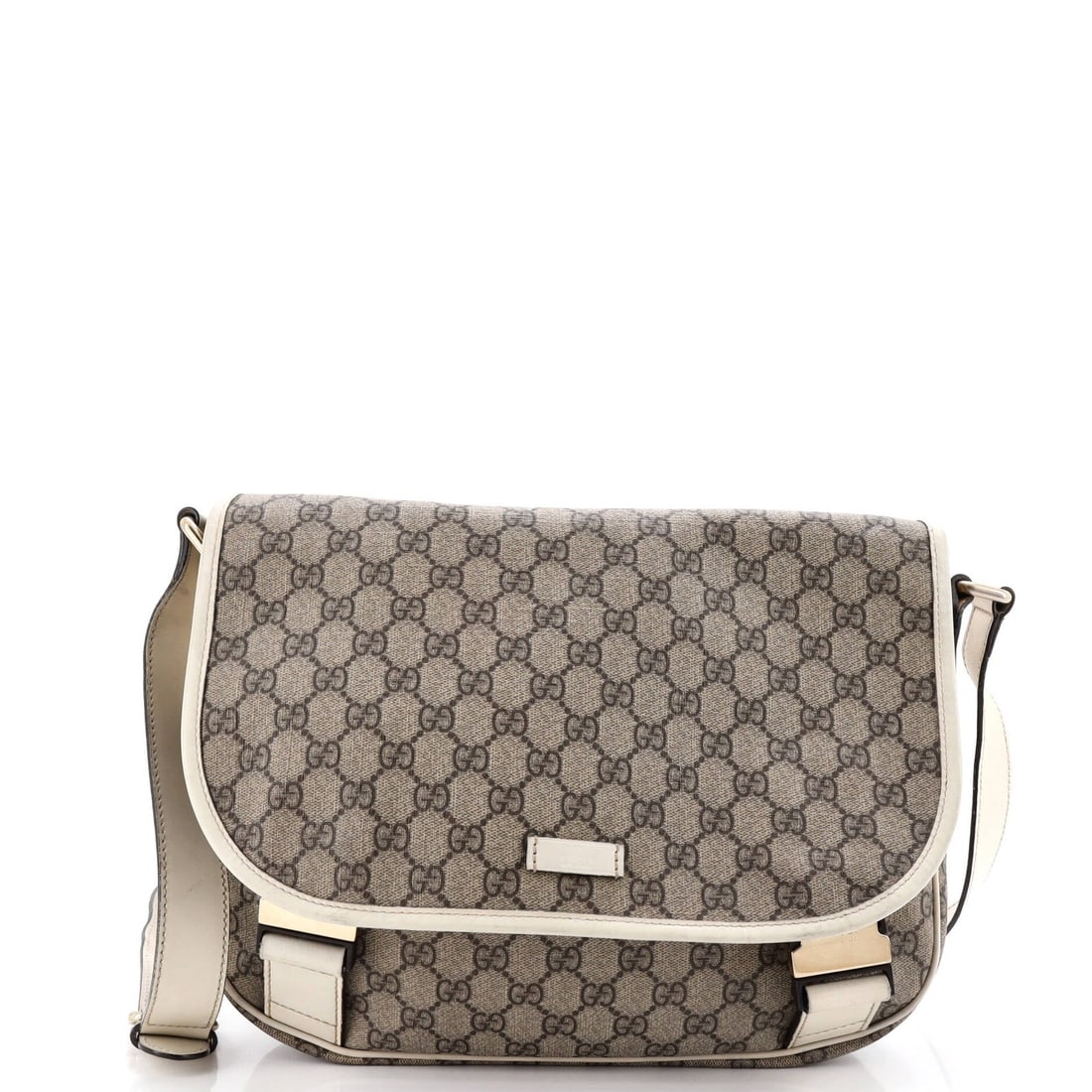 Gucci medium messenger bag with double buckle and coated canvas.: Gucci medium messenger bag with double buckle and coated canvas. A sleek and sophisticated Gucci messenger bag, this double buckle style boasts a crisp white exterior with gold hardware, perfect for
