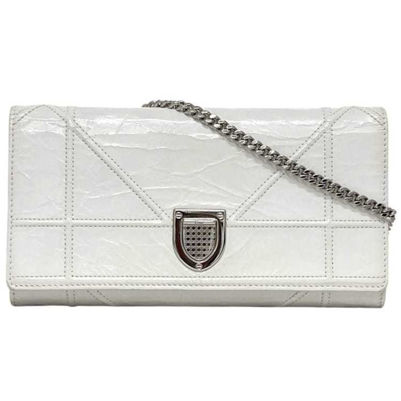 Christian Dior Leather Shoulder Bag: Christian Dior Leather Shoulder Bag A pristine white leather shoulder bag from the iconic Christian Dior brand, boasting clean lines and timeless elegance. With its classic design and spacious interio