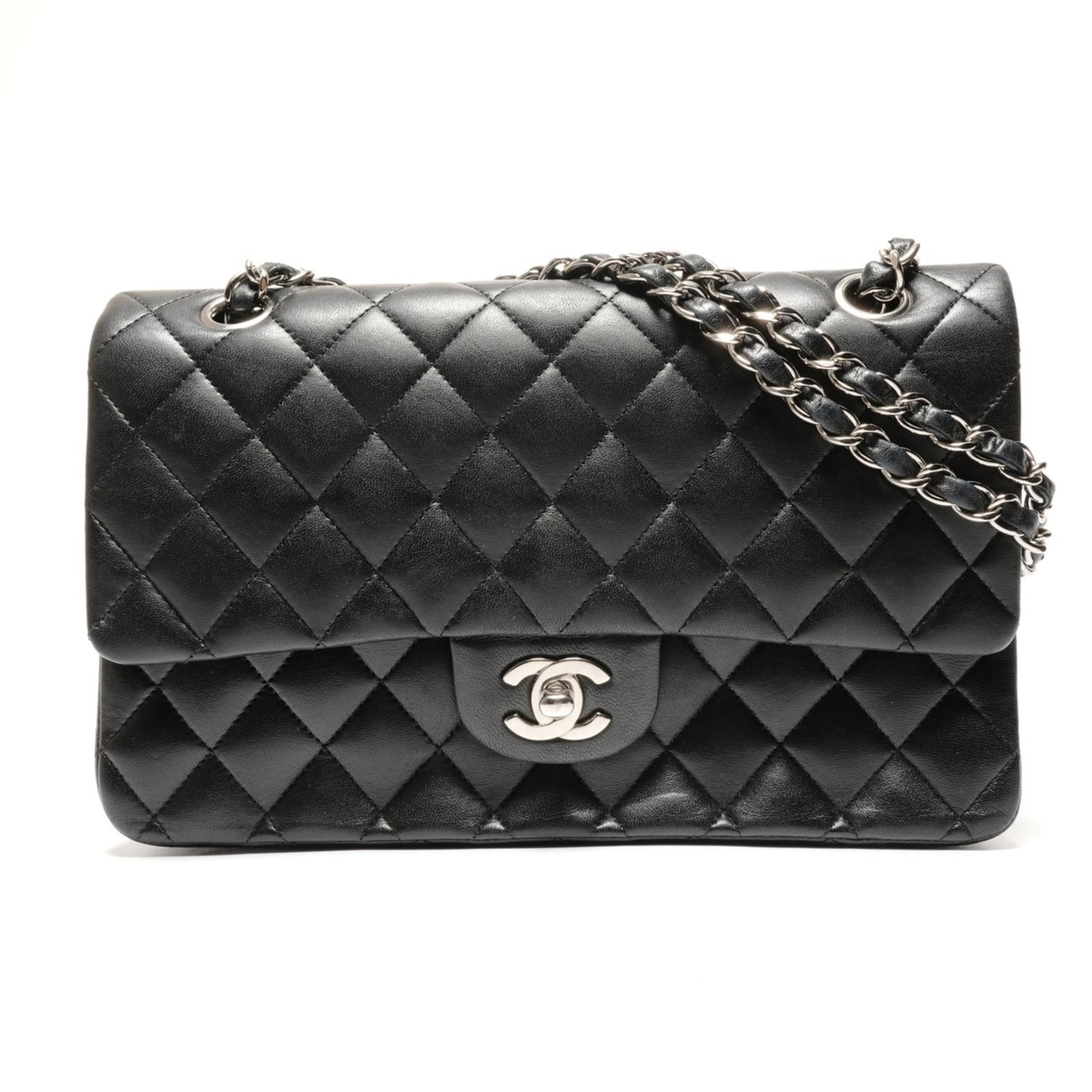 Chanel Leather Shoulder Bag: Chanel Leather Shoulder Bag A timeless Chanel shoulder bag in sleek black lambskin leather, perfect for adding a touch of sophisticated elegance to any outfit. With its classic design and spacious int
