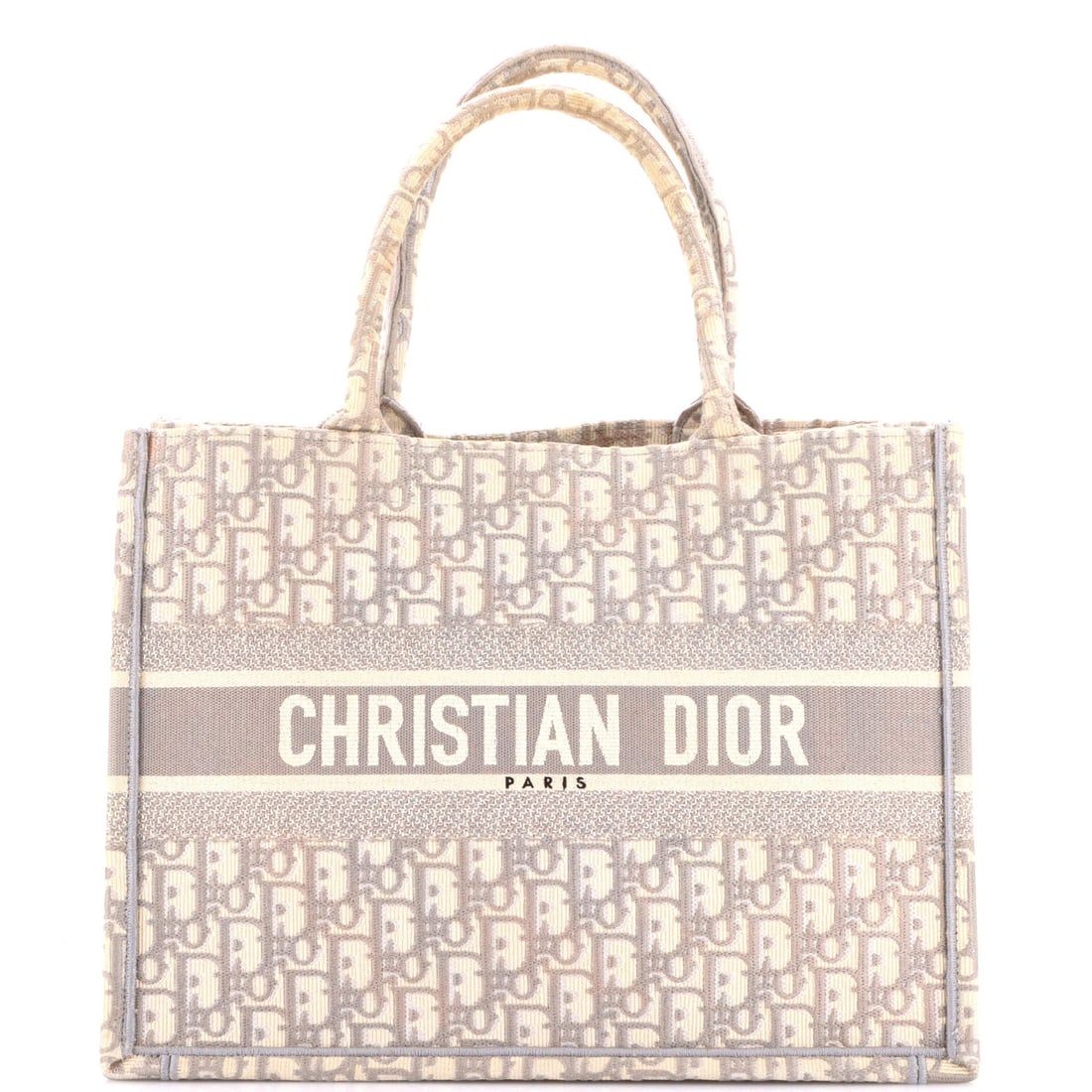 Christian Dior book tote canvas medium oblique: Christian Dior book tote canvas medium oblique A stylish and timeless Christian Dior book tote, the oblique design adds a touch of sophistication to any outfit. Made from high-quality canvas in a