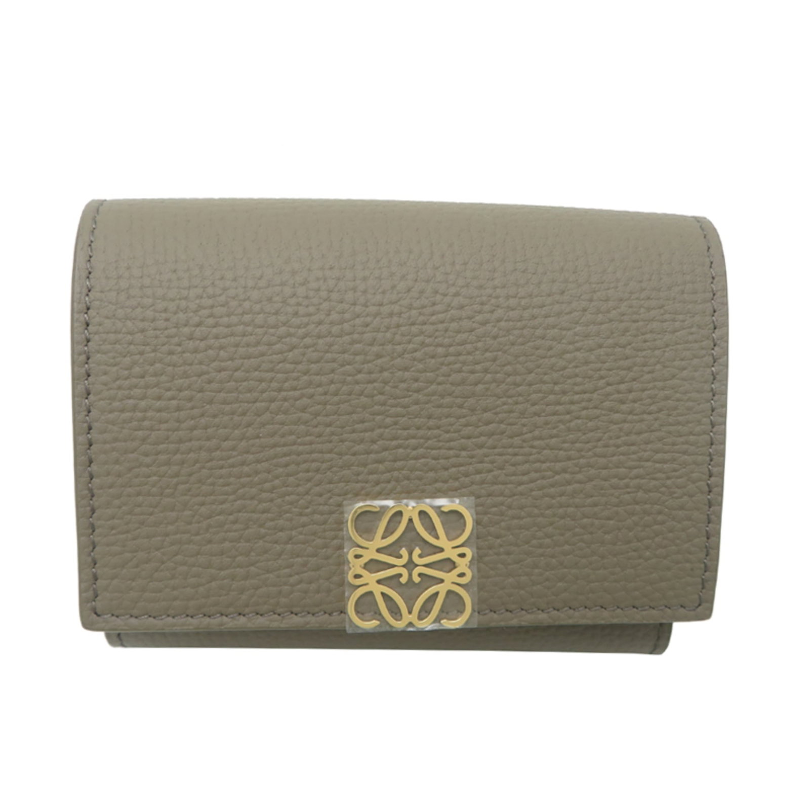 Loewe Wallet (Tri-Fold) Leather: Loewe Wallet (Tri-Fold) Leather A sleek and sophisticated tri-fold wallet from renowned Spanish luxury brand Loewe, crafted from high-quality leather that exudes timeless elegance. With its classic