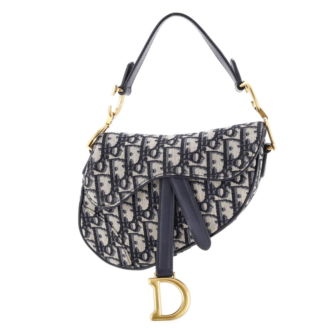 Christian Dior mini canvas saddle handbag: Christian Dior mini canvas saddle handbag Elevate your everyday style with the iconic Christian Dior Saddle mini canvas handbag, boasting a chic oblique design and sleek blue exterior that adds a