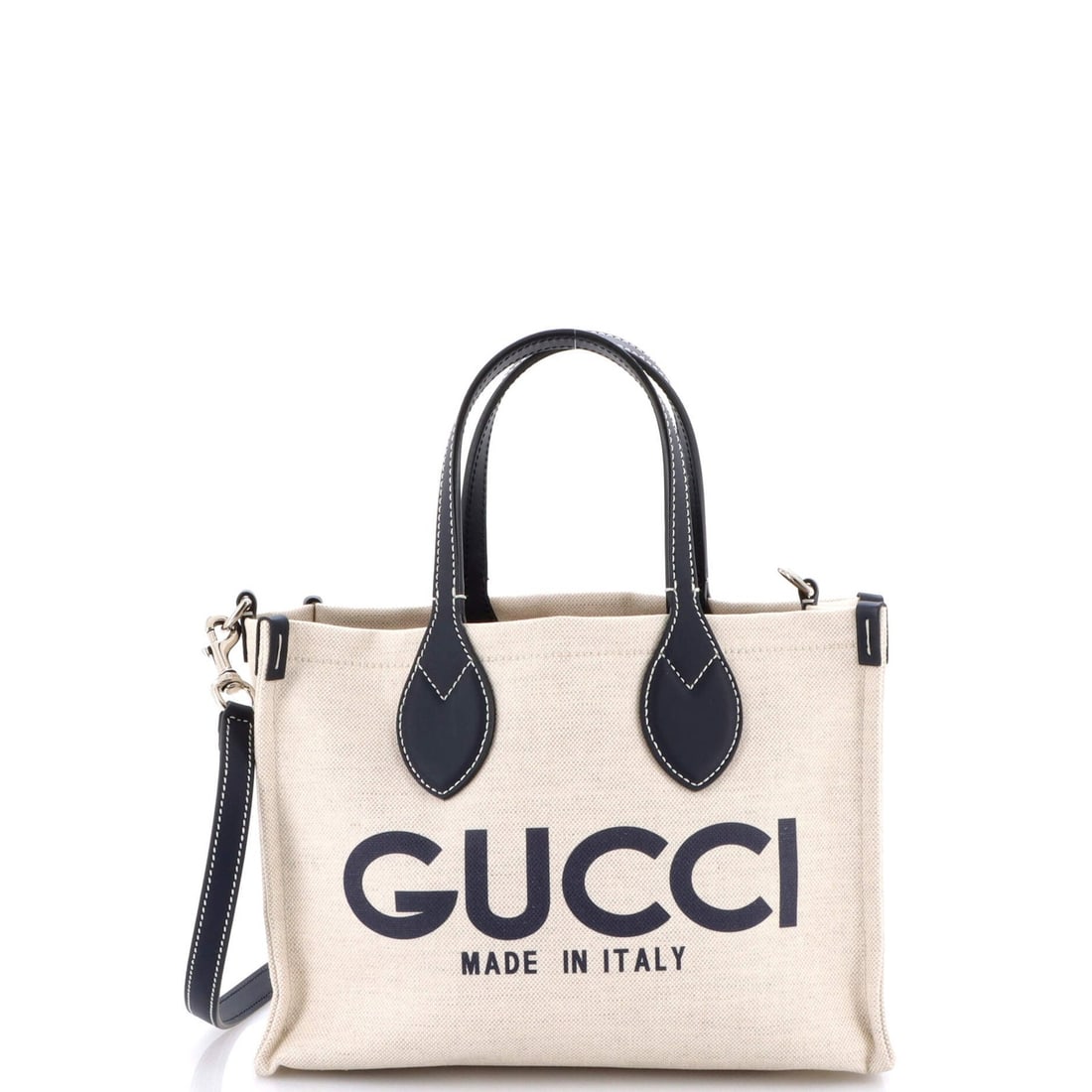 Gucci Logo Shopper Tote Printed Canvas Small: Gucci Logo Shopper Tote Printed Canvas Small Elevate your daily style with the iconic Gucci Logo Shopper Tote, boasting a vibrant blue canvas exterior and neutral interior. This classic shoulder bag