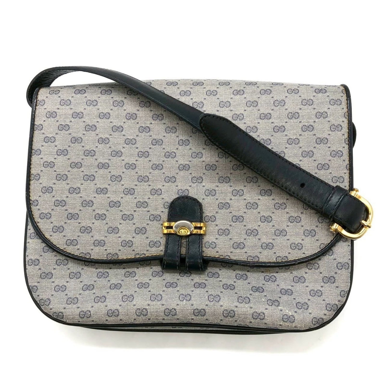 Gucci leather micro shoulder bag: Gucci leather micro shoulder bag Elevate your everyday style with this pre-loved Gucci micro shoulder bag, crafted from luxurious micro GG leather in a classic navy hue. With its sleek open pocket
