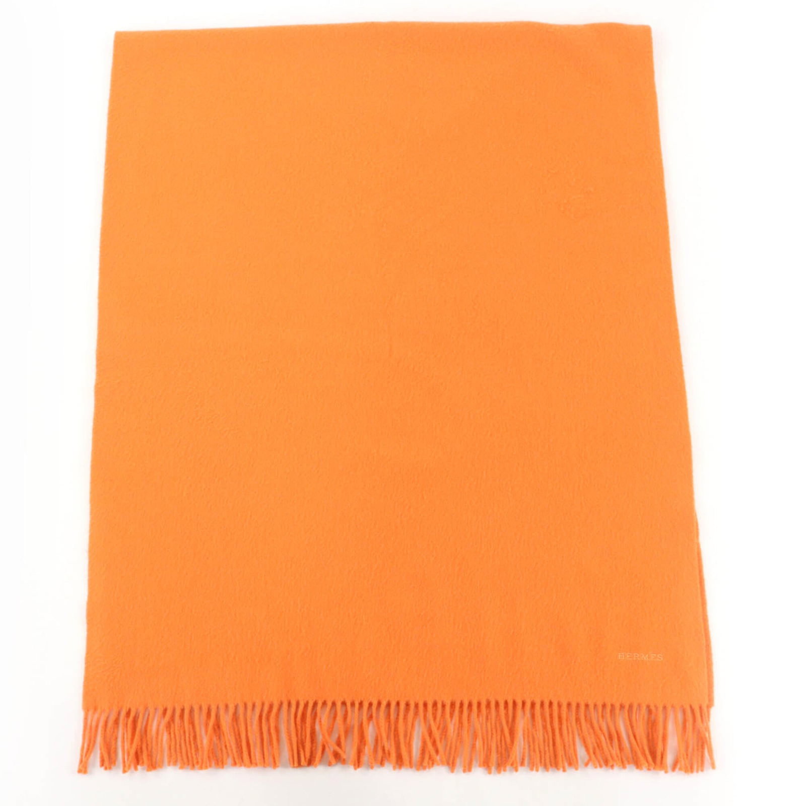 Hermes Stole Cashmere: Hermes Stole Cashmere A vibrant orange Herm?s stole made from luxurious cashmere, adding a pop of color to any outfit. Its classic design and high-quality material make it a timeless piece that