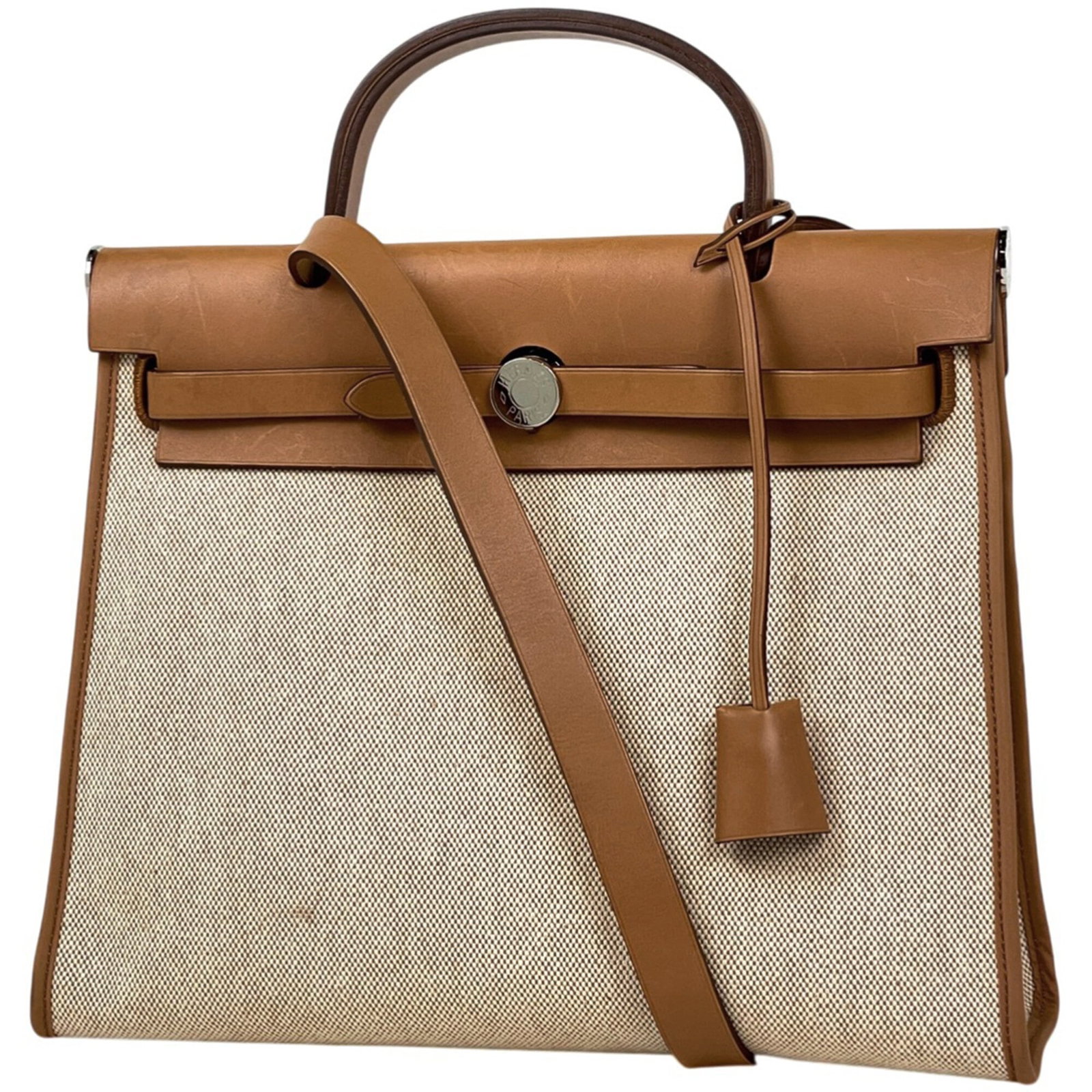 Hermes Handbag, Pouch, Shoulder Bag Toile H, Leather: Hermes Handbag, Pouch, Shoulder Bag Toile H, Leather A timeless piece of luxury, this pre-owned Hermes Toile H leather handbag boasts rich, natural tones and exceptional craftsmanship. With its