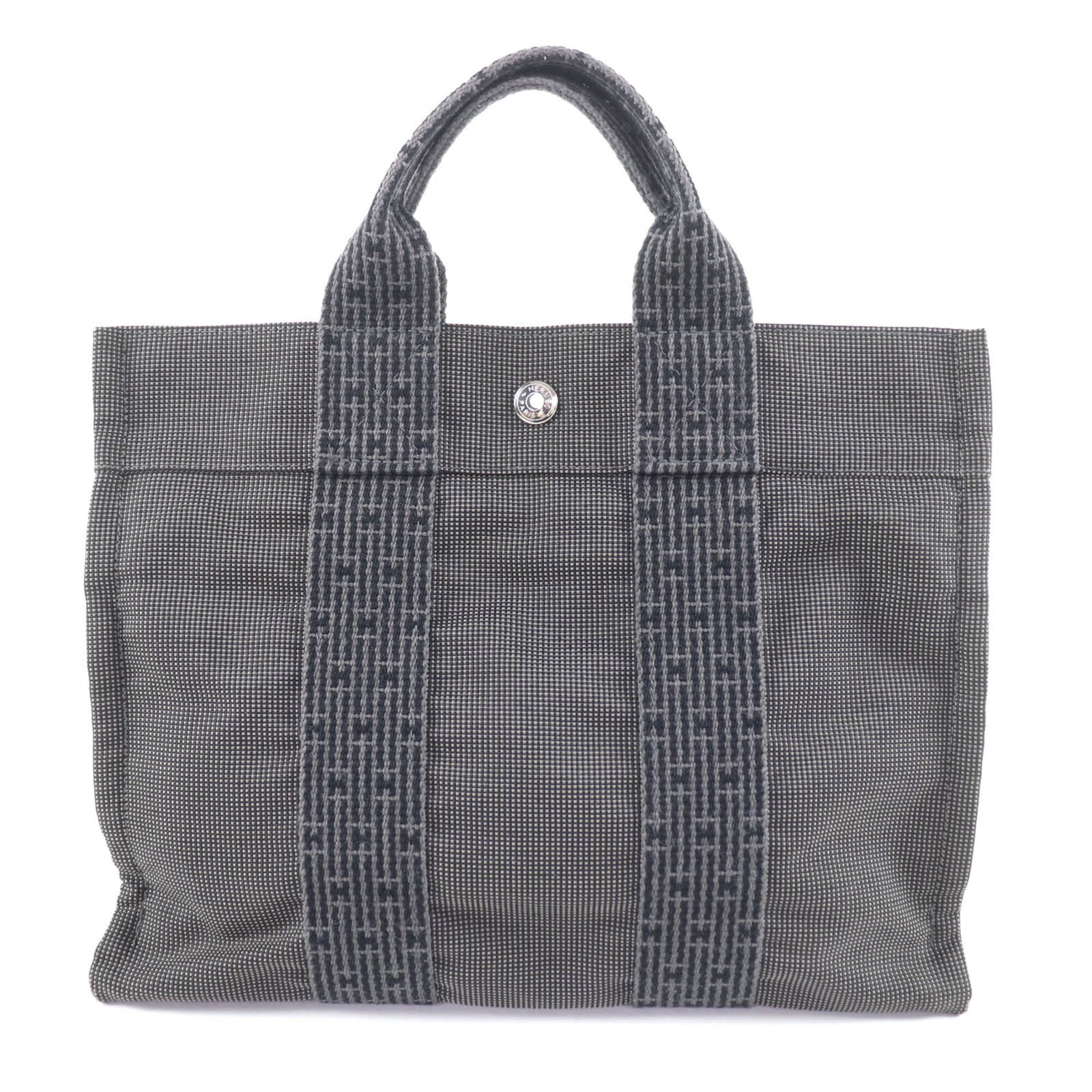 Hermes Handbag Polyamide, Polyester: Hermes Handbag Polyamide, Polyester A stunning pre-owned Hermes handbag in a sleek gray hue, crafted from durable polyamide and polyester materials. With its signature silver hardware and timeless des