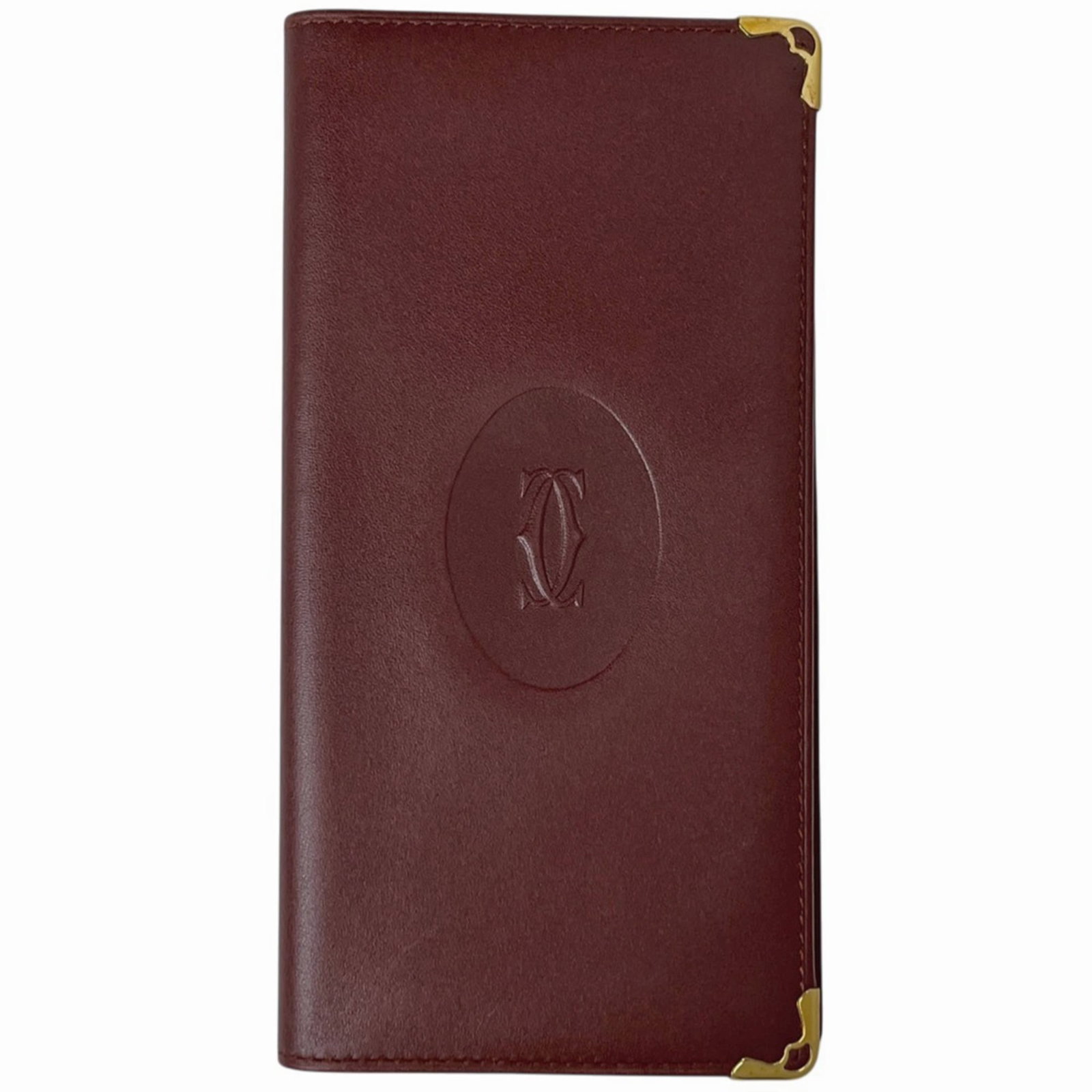 Cartier long leather bi-fold wallet: Cartier long leather bi-fold wallet A stylish Cartier long leather bi-fold wallet in rich Bordeaux hue, perfect for adding a touch of sophistication to your daily essentials. With its classic design