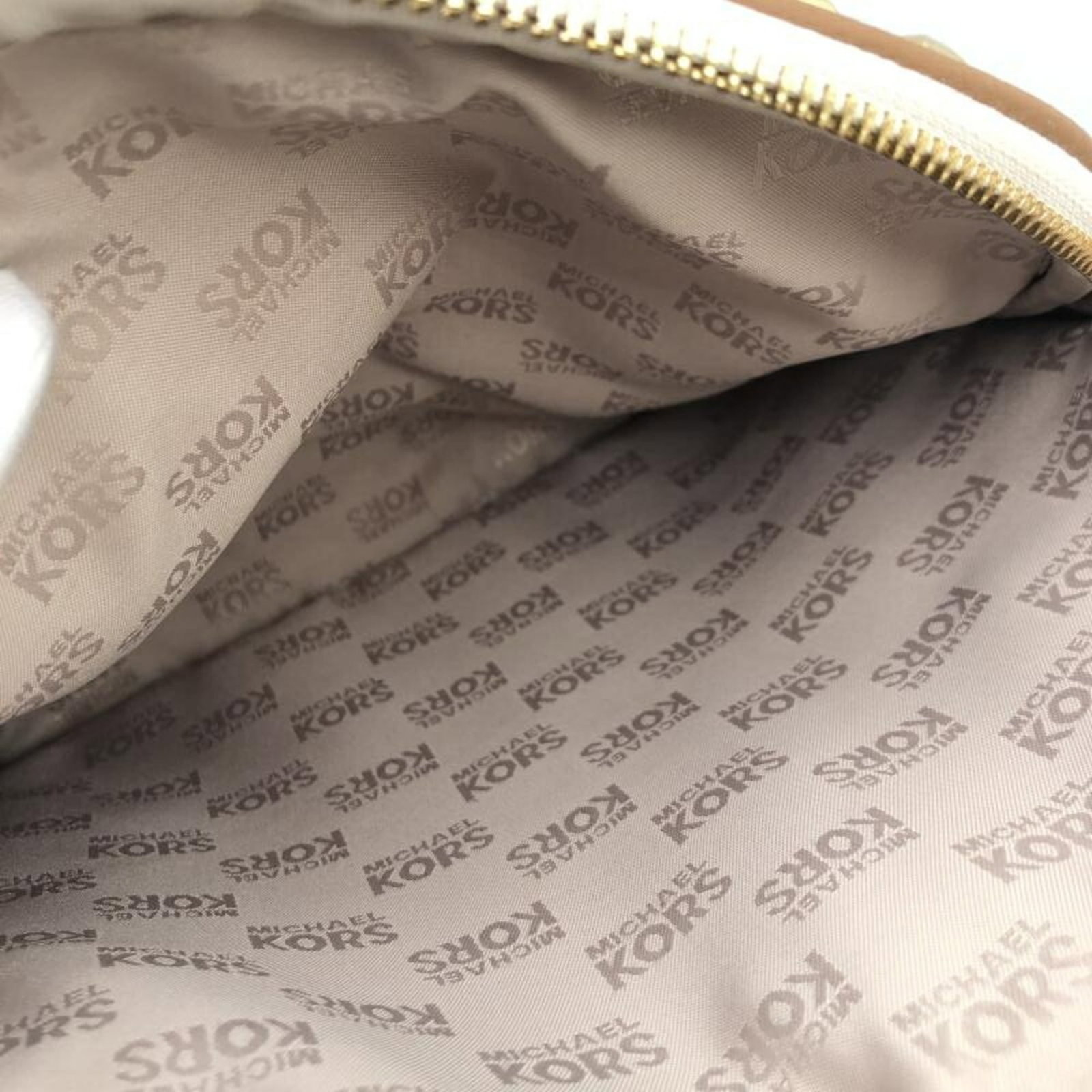 Michael Kors is a backpack. - 6