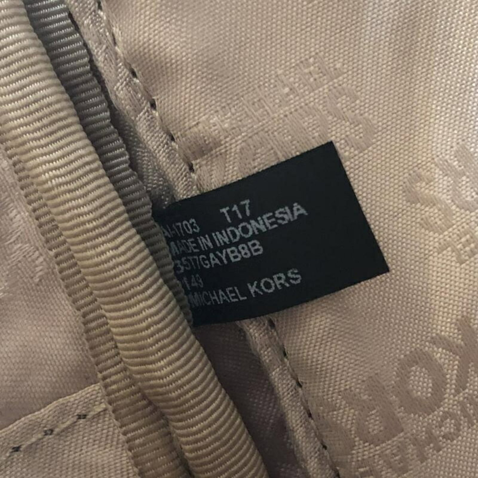 Michael Kors is a backpack. - 7