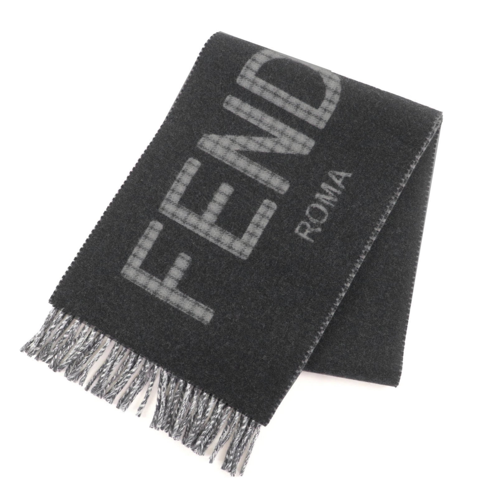 Fendi Stole Wool 75%, Cashmere 25%: Fendi Stole Wool 75%, Cashmere 25% Experience the epitome of luxury with this exquisite Fendi stole, crafted from a sumptuous blend of 75% wool and 25% cashmere. Its soft, gray hue is both timeless an
