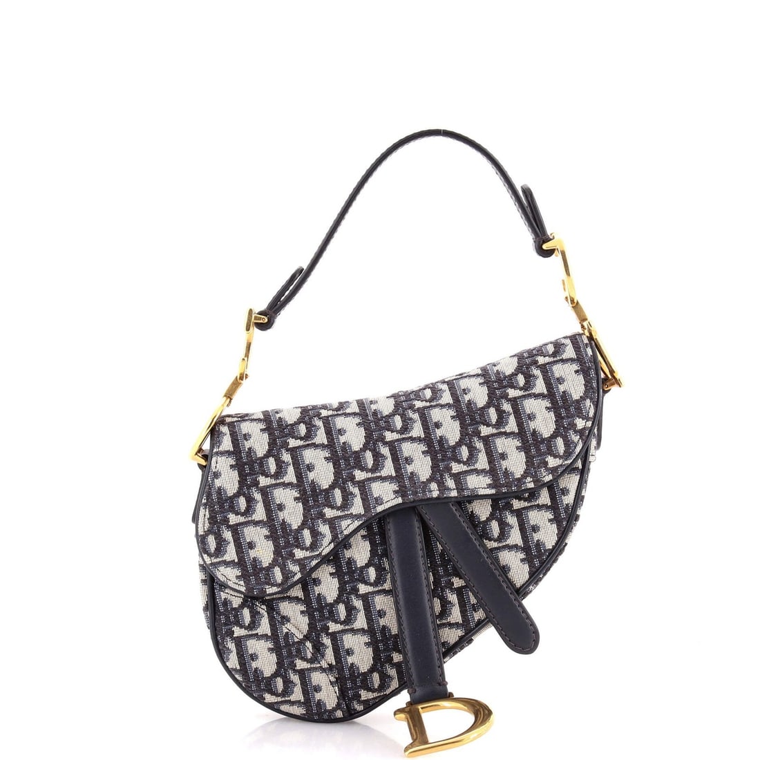 Christian Dior mini canvas saddle handbag: Christian Dior mini canvas saddle handbag Elevate your style with the iconic Christian Dior mini canvas saddle handbag, boasting a sleek oblique design and classic blue hue that exudes timeless sophis