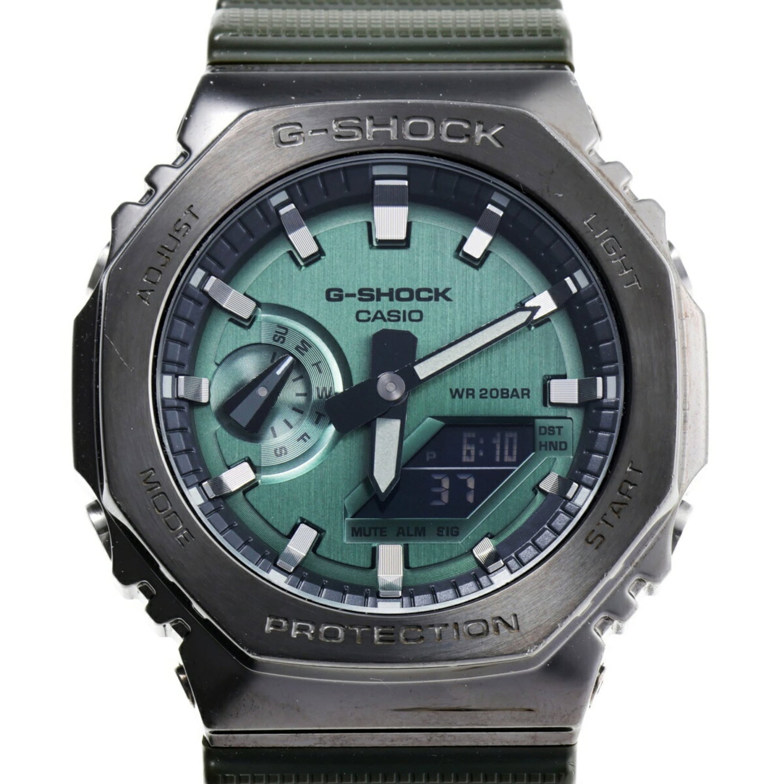 Casio Wristwatch: Casio Wristwatch A stylish and durable Casio wristwatch, perfect for everyday wear, boasts a sleek stainless steel case and band, with a vibrant green dial that adds a pop of color to any outfit. With