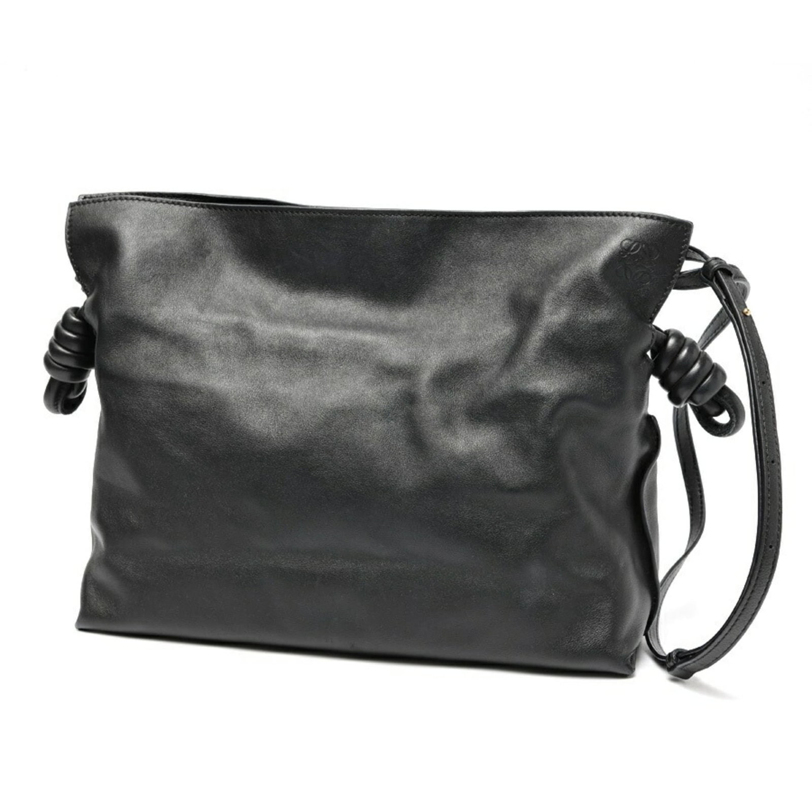 Loewe is a leather shoulder bag.: Loewe is a leather shoulder bag. A sleek and sophisticated black leather shoulder bag from renowned luxury brand Loewe, boasting clean lines and classic design that exudes timeless elegance. With its