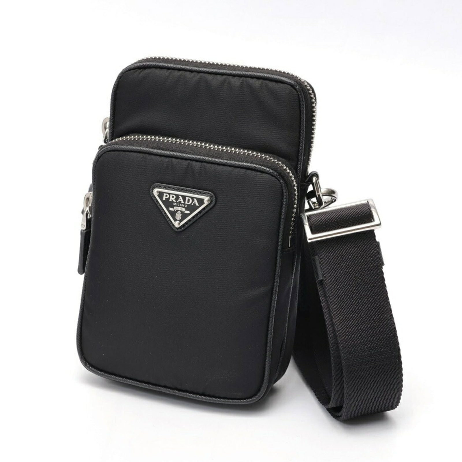 Prada Pouch Nylon: Prada Pouch Nylon A sleek and sophisticated accessory, this Prada Pouch Nylon is a stylish addition to any handbag collection. Made from durable nylon, its classic design and timeless black color