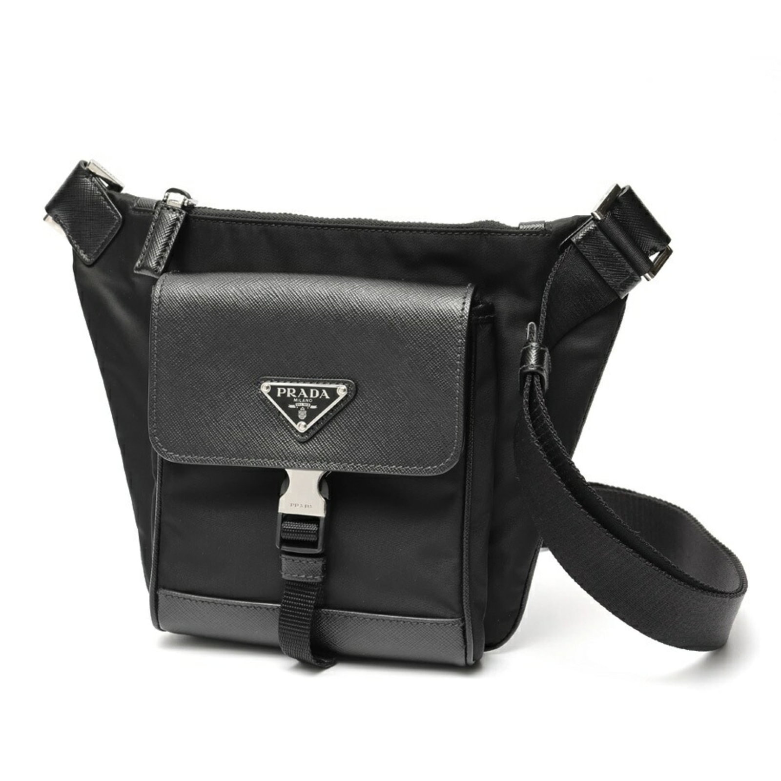 Nylon Prada Sling Bag: Nylon Prada Sling Bag A sleek and versatile Prada sling bag, crafted from durable nylon, is up for grabs in its original black hue. With its compact 18.5cm x 25.5cm dimensions, this stylish shoulder b