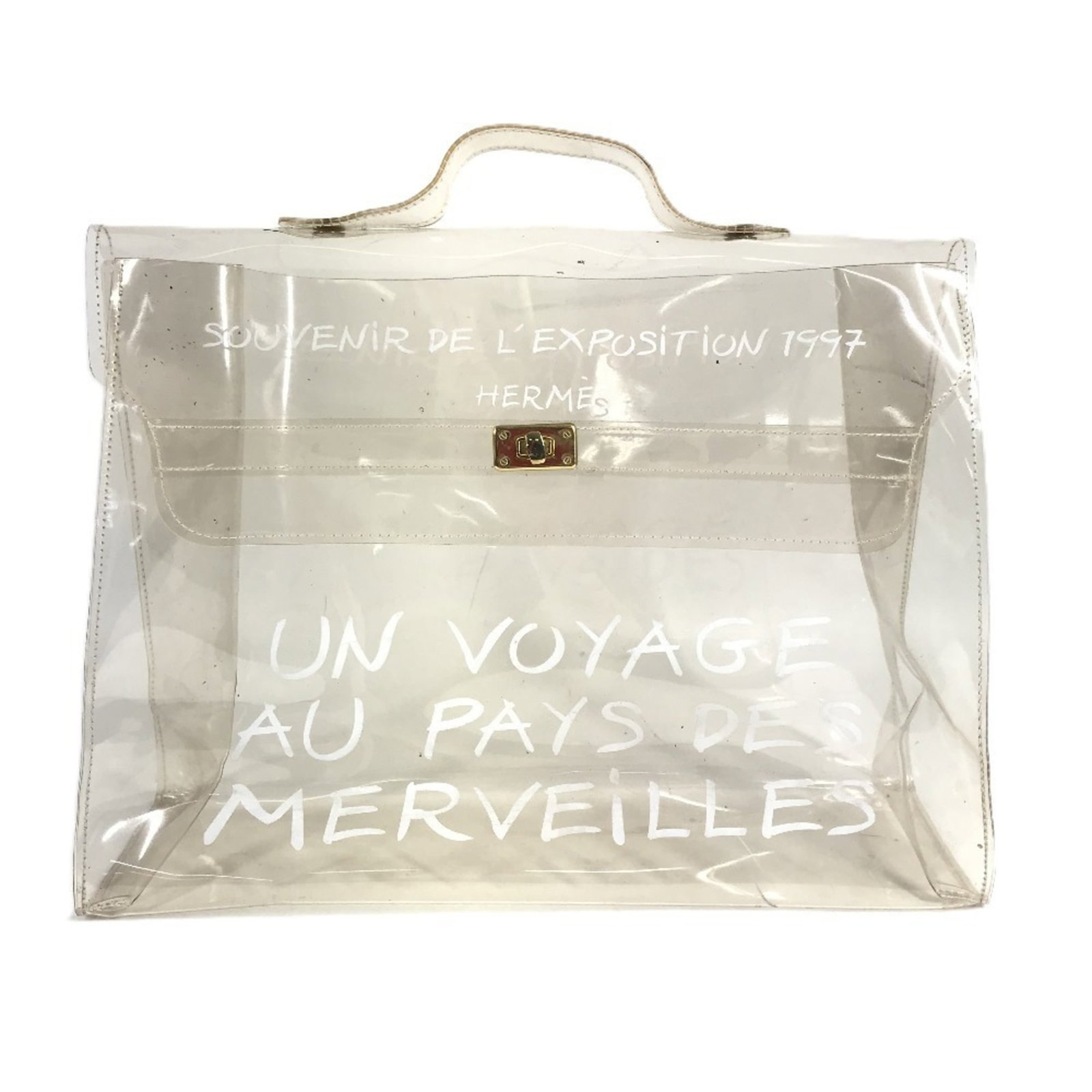 Hermes vinyl tote bag: Hermes vinyl tote bag A rare opportunity to own a piece of luxury, this pre-owned Hermes vinyl tote bag boasts the iconic brand's signature style with its sleek clear vinyl exterior and timeless