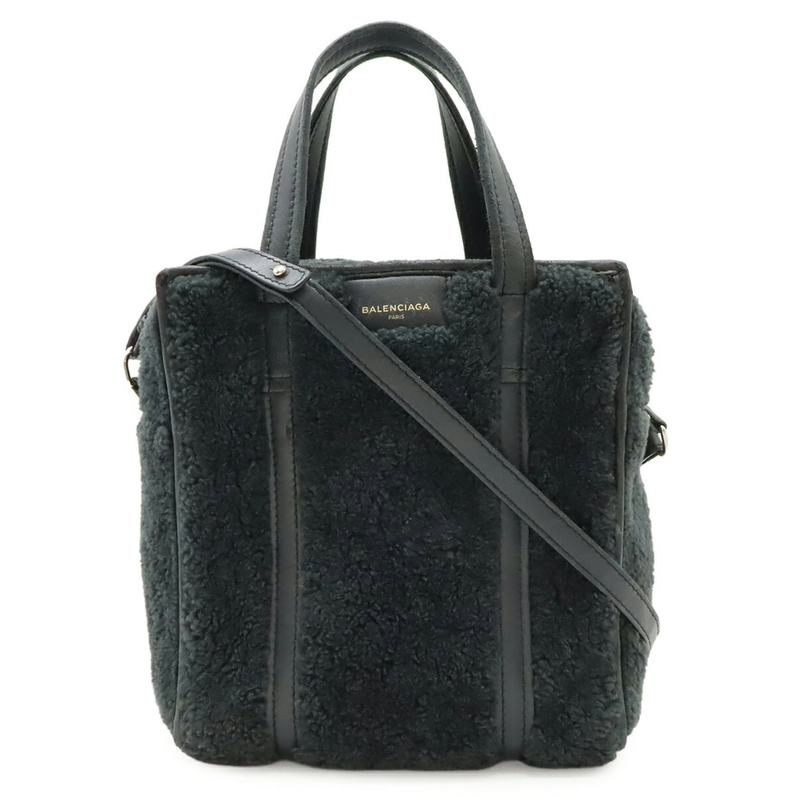 Leather shoulder bag by Balenciaga: Leather shoulder bag by Balenciaga A sleek and sophisticated Balenciaga leather shoulder bag, crafted from rich black mouton leather, boasts a timeless design that exudes luxury and elegance. With