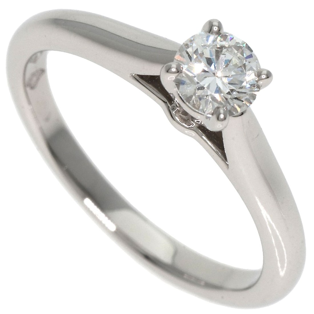 CARTIER Solitaire Diamond #45 Ring Platinum PT950: CARTIER Solitaire Diamond #45 Ring Platinum PT950 The CARTIER Solitaire Diamond #45 Ring is a masterclass in understated elegance, boasting a sleek platinum band adorned with a stunning D-color diamon
