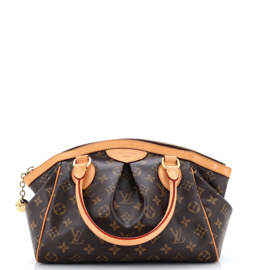Louis Vuitton Tivoli Handbag Monogram Canvas PM: Louis Vuitton Tivoli Handbag Monogram Canvas PM A luxurious Louis Vuitton Tivoli Handbag in rich brown monogram canvas, boasting iconic gold hardware and supple brown interior, is up for grabs. With