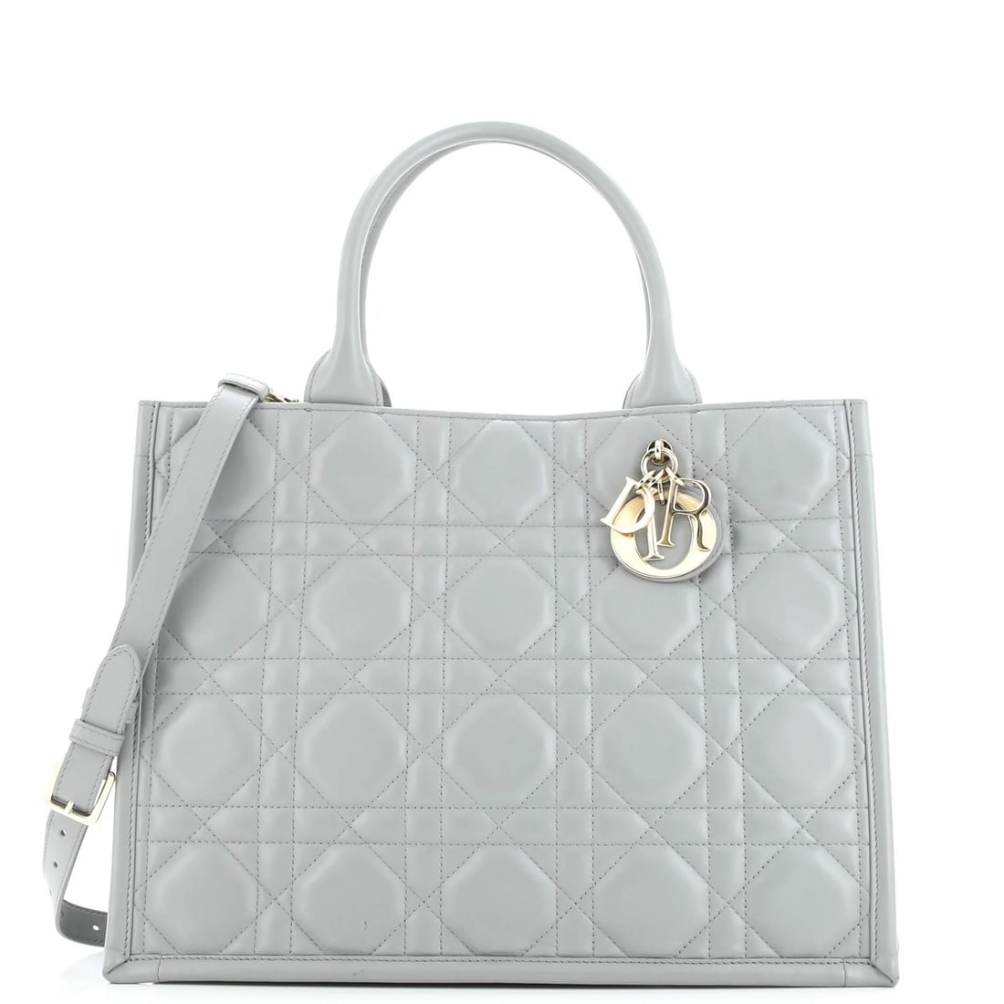 Christian Dior Book Tote with Strap Macrocannage Quilt Calfskin Large: Christian Dior Book Tote with Strap Macrocannage Quilt Calfskin Large Elevate your daily routine with the iconic Christian Dior Book Tote, boasting a sophisticated gray leather exterior and rich suede